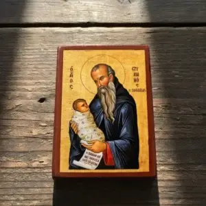 Saint Stylianos Byzantine wooden icon with swaddled child.